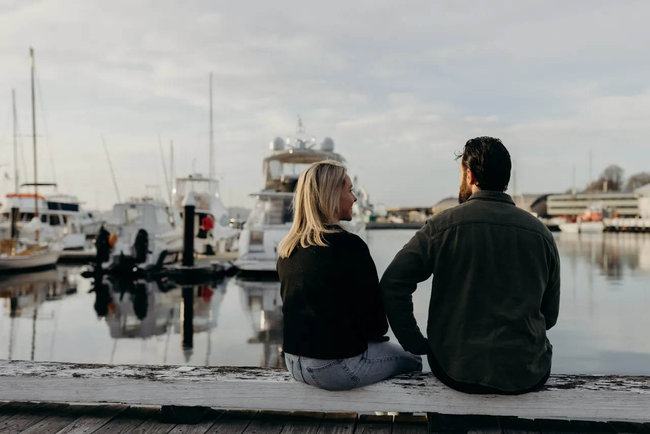 Couple Sitting by the Hobart Waterfront