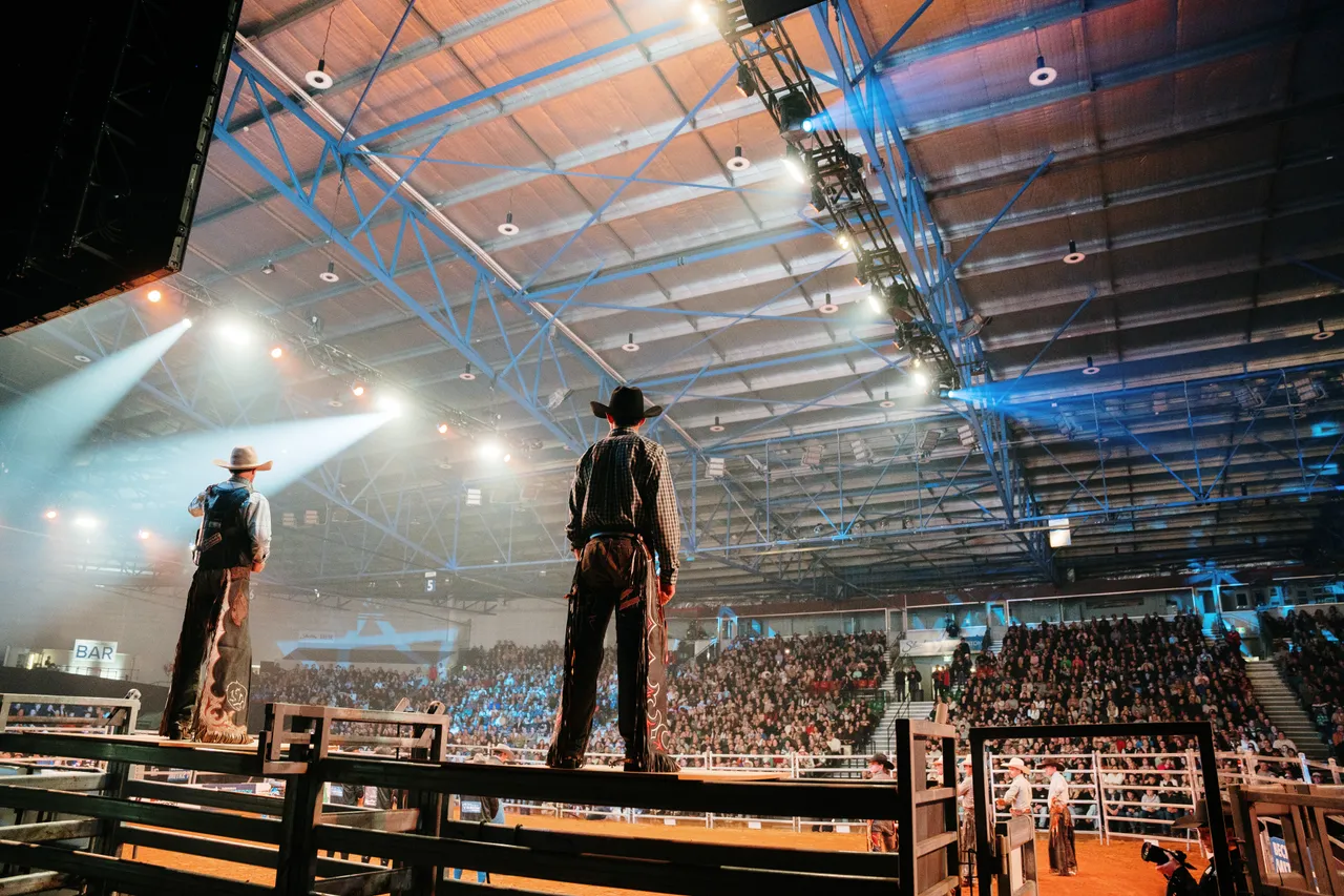 Bull Riders at the Island Stampede Rodeo