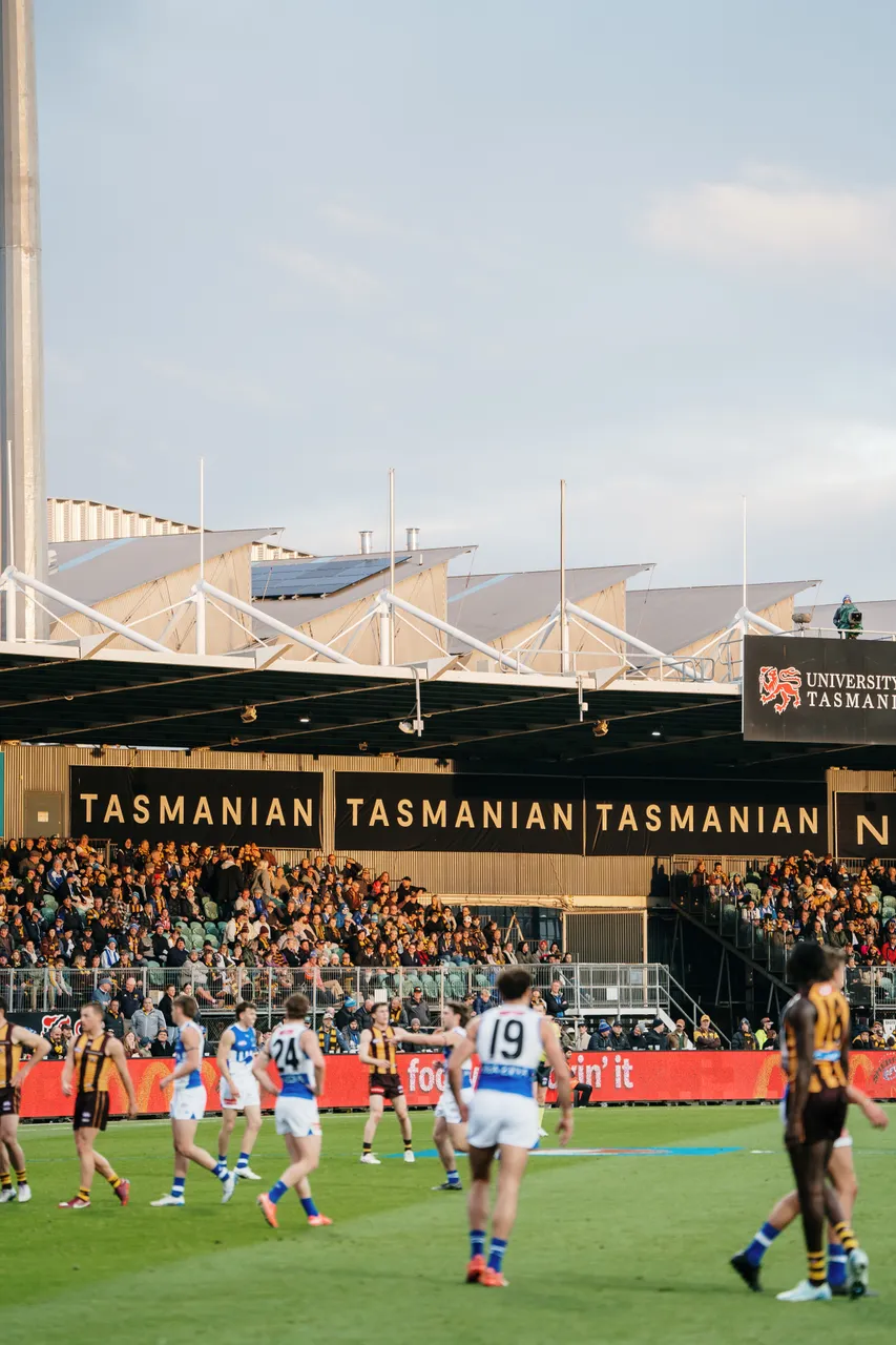 Spectators Watching Football at UTAS Stadium