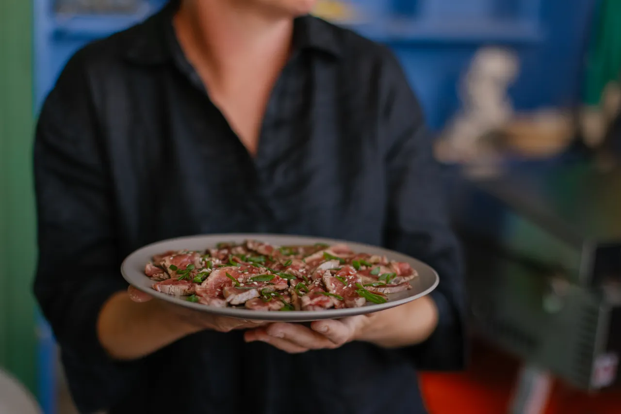 Person Serving Beef Tataki