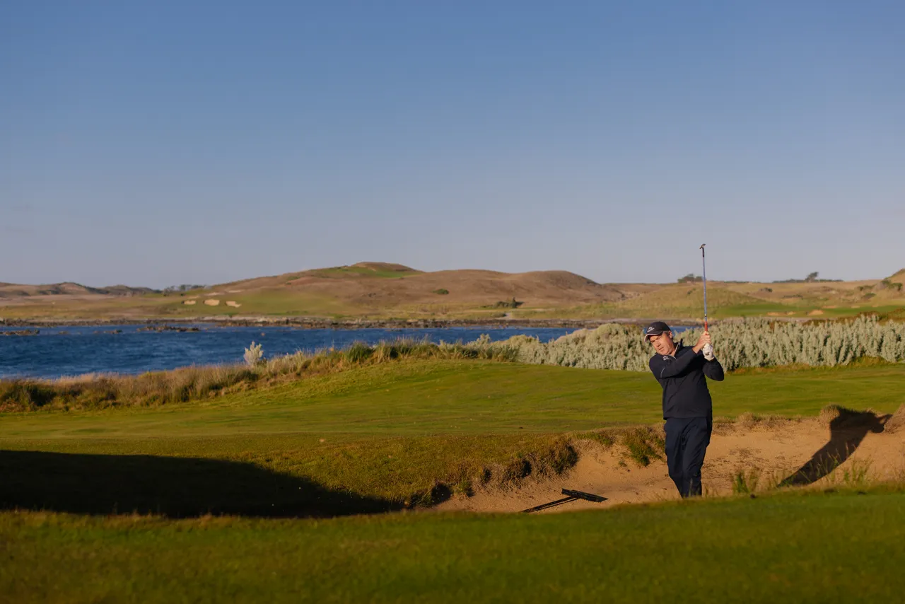 Golfer Chipping from Bunker
