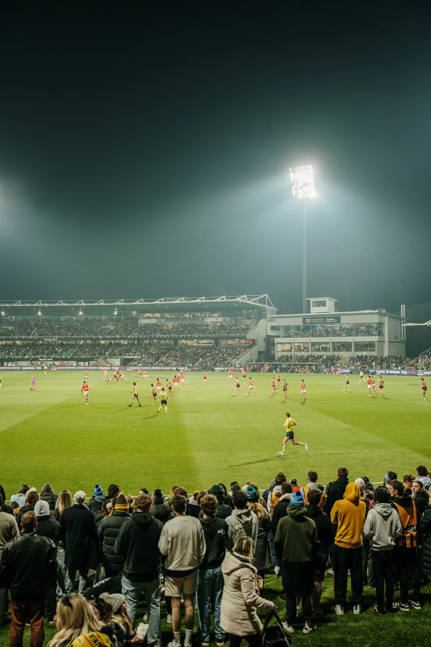 Spectators Watching Football at UTAS Stadium