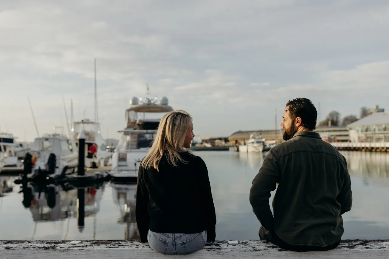 Couple Sitting by the Hobart Waterfront