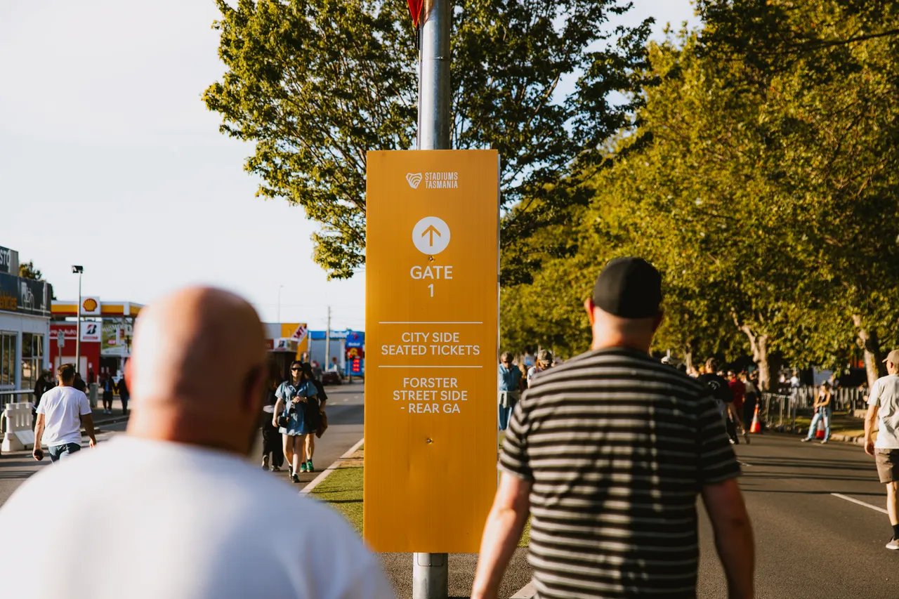 Crowd Walking to Gate at UTAS Stadium
