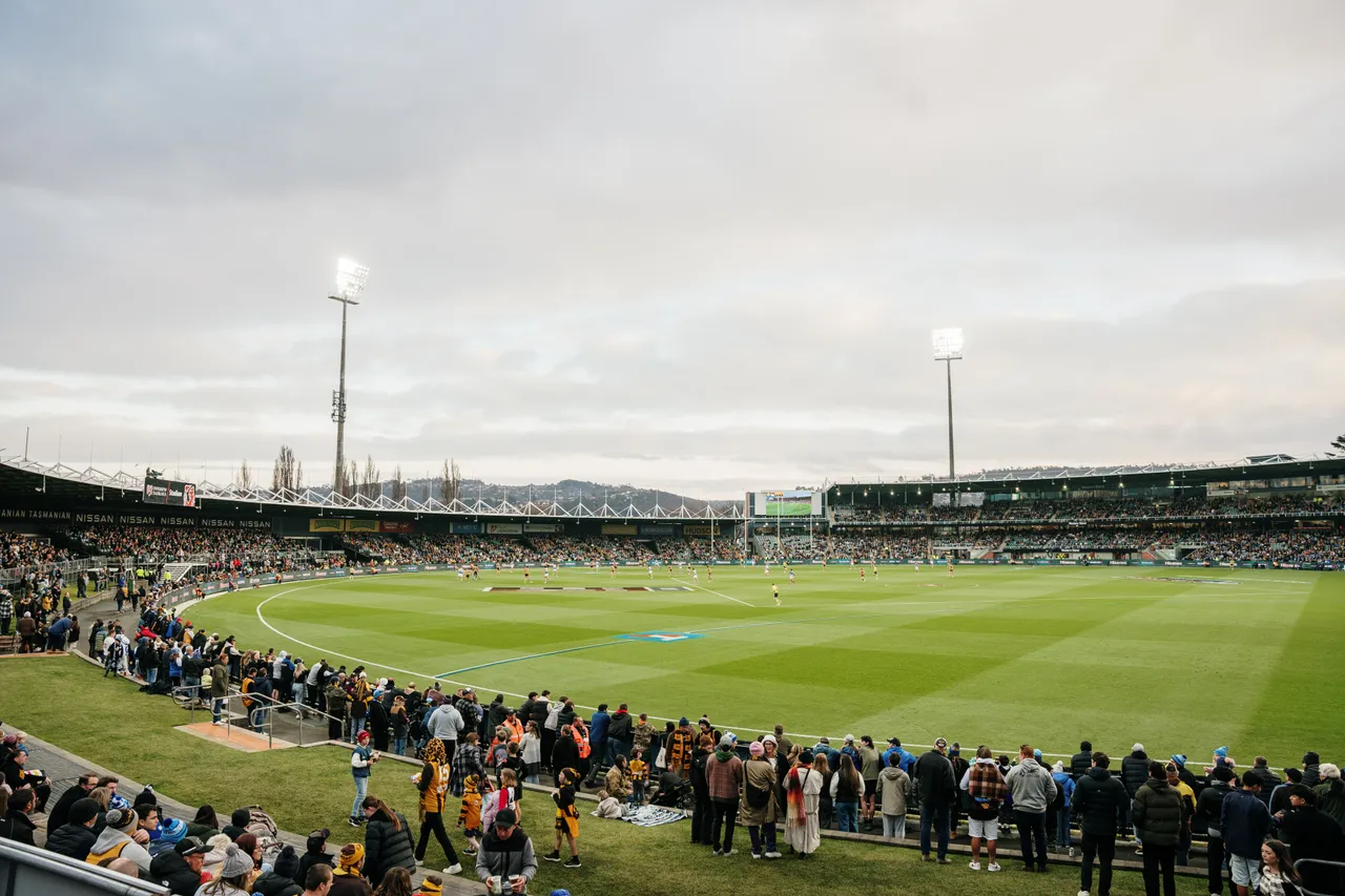Spectators Watching Football at UTAS Stadium
