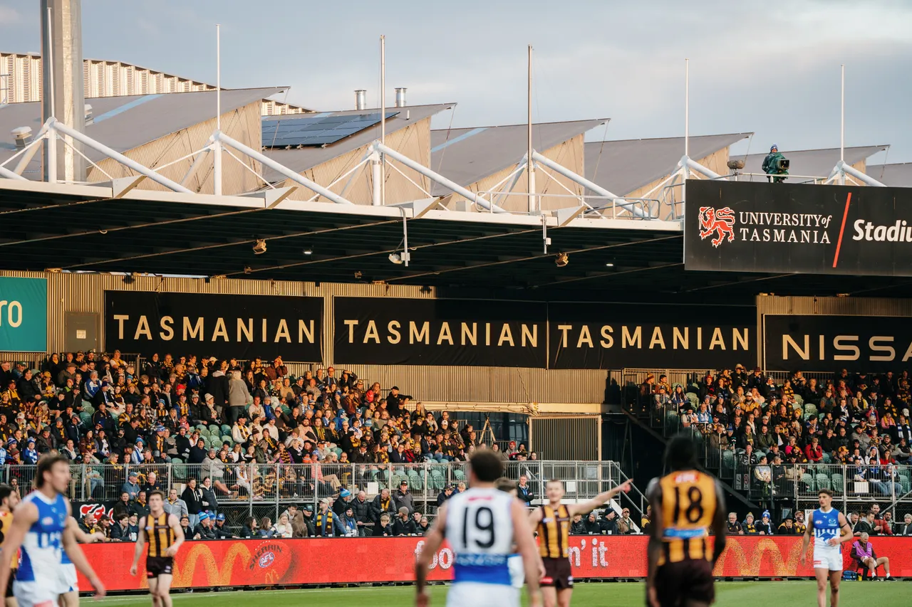 Spectators Watching Football at UTAS Stadium