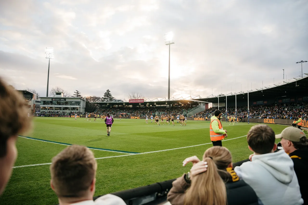 Spectators Watching Football at UTAS Stadium