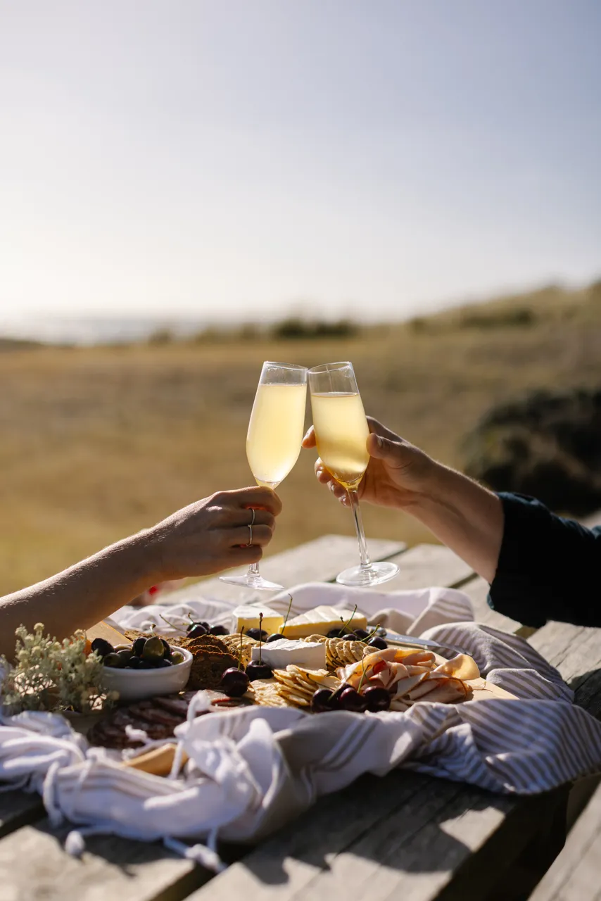 Sparkling Cheers Over Cheese Board
