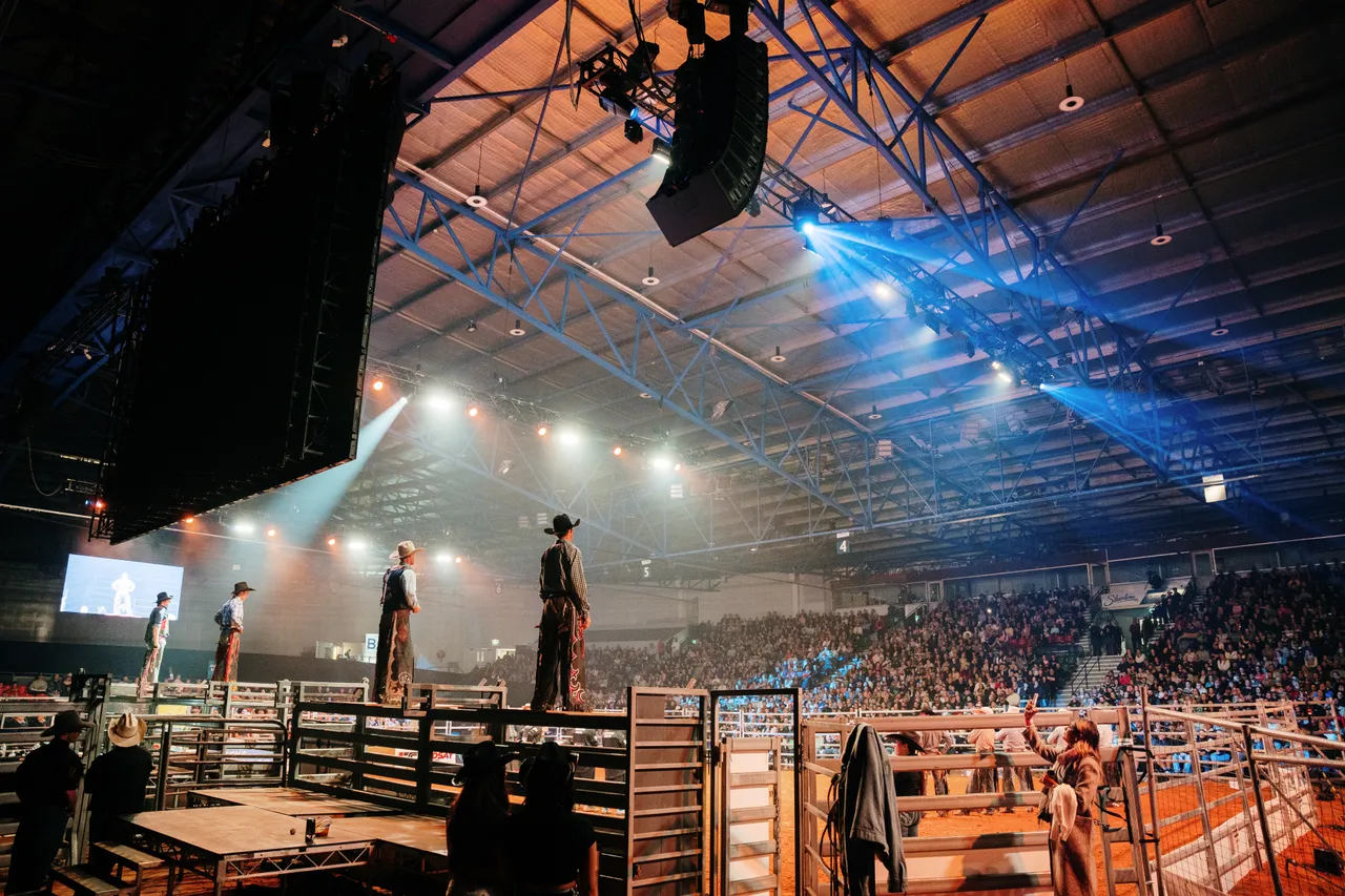 Bull Riders at the Island Stampede Rodeo