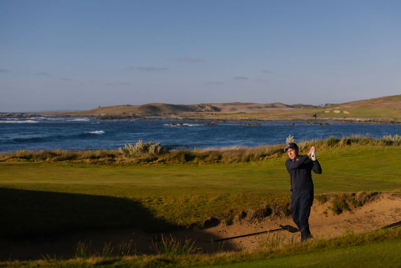 Golfer Chipping from Bunker