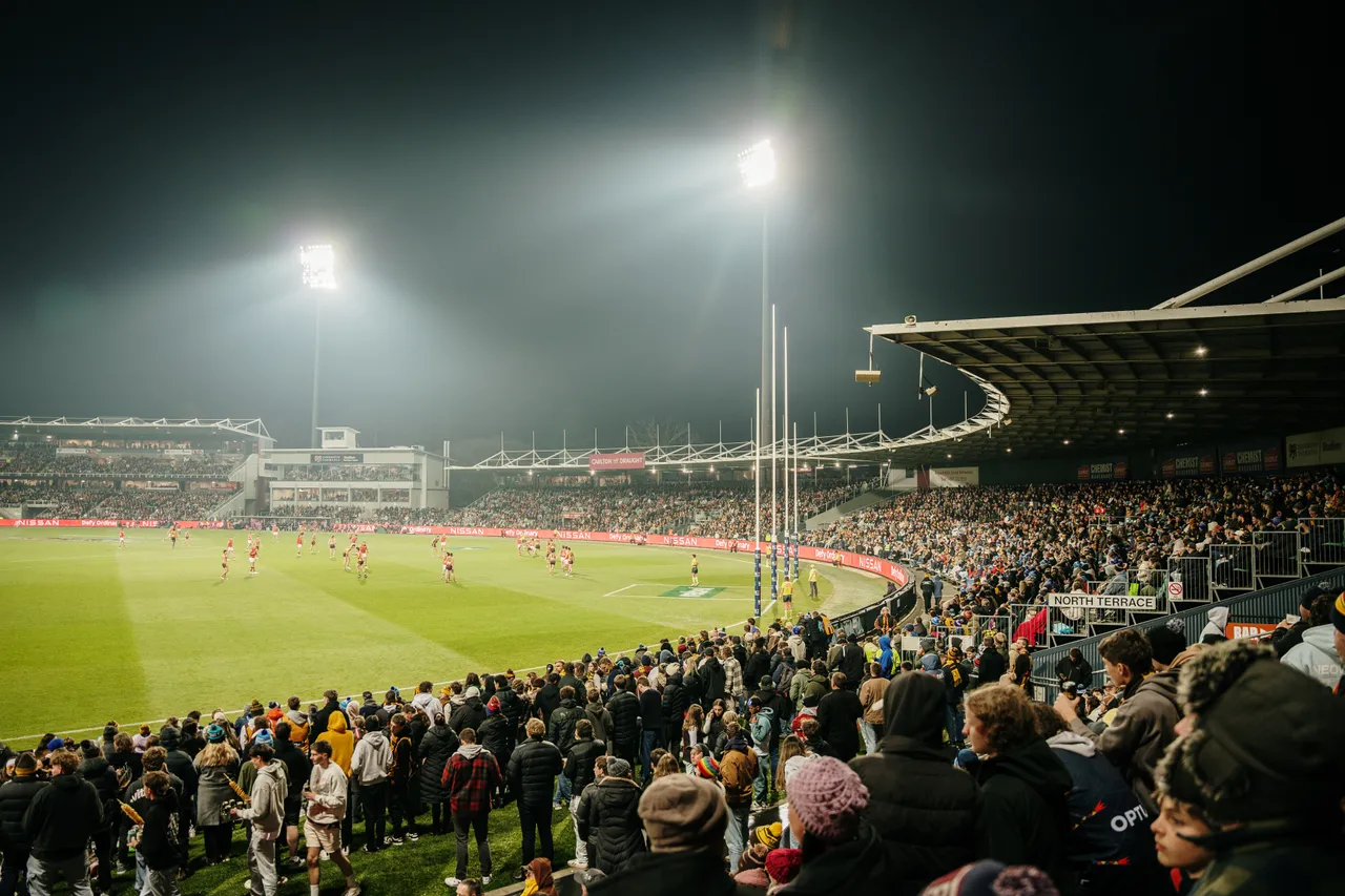 Spectators Watching Football at UTAS Stadium