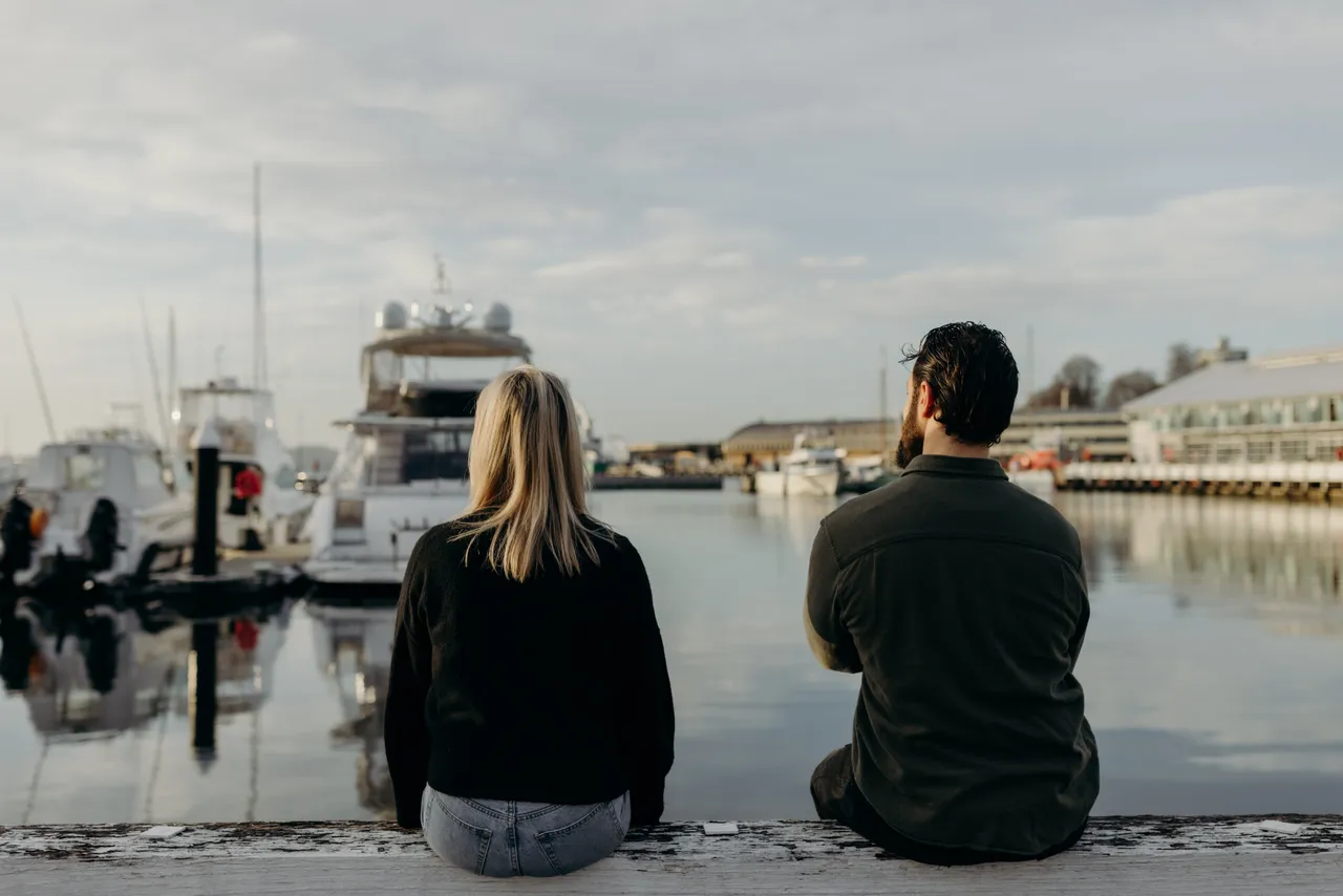 Couple Sitting by the Hobart Waterfront