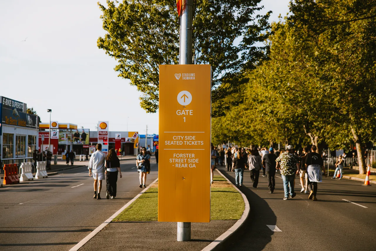 Crowd Walking to Gate at UTAS Stadium