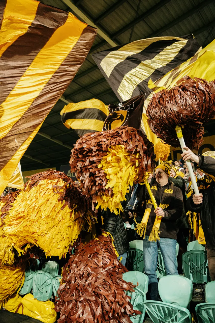 Waving Hawks Flags at UTAS Stadium