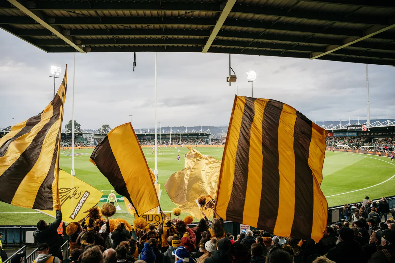 Waving Hawks Flags at UTAS Stadium