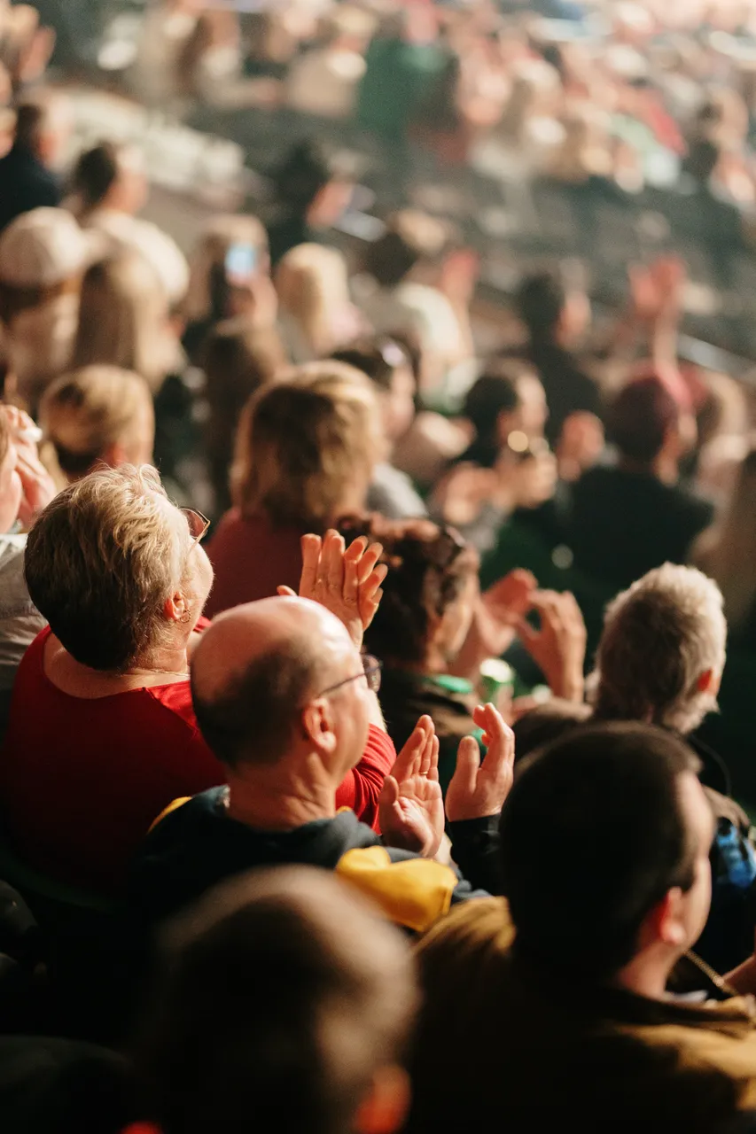 Audience Clapping at the Island Stampede Rodeo