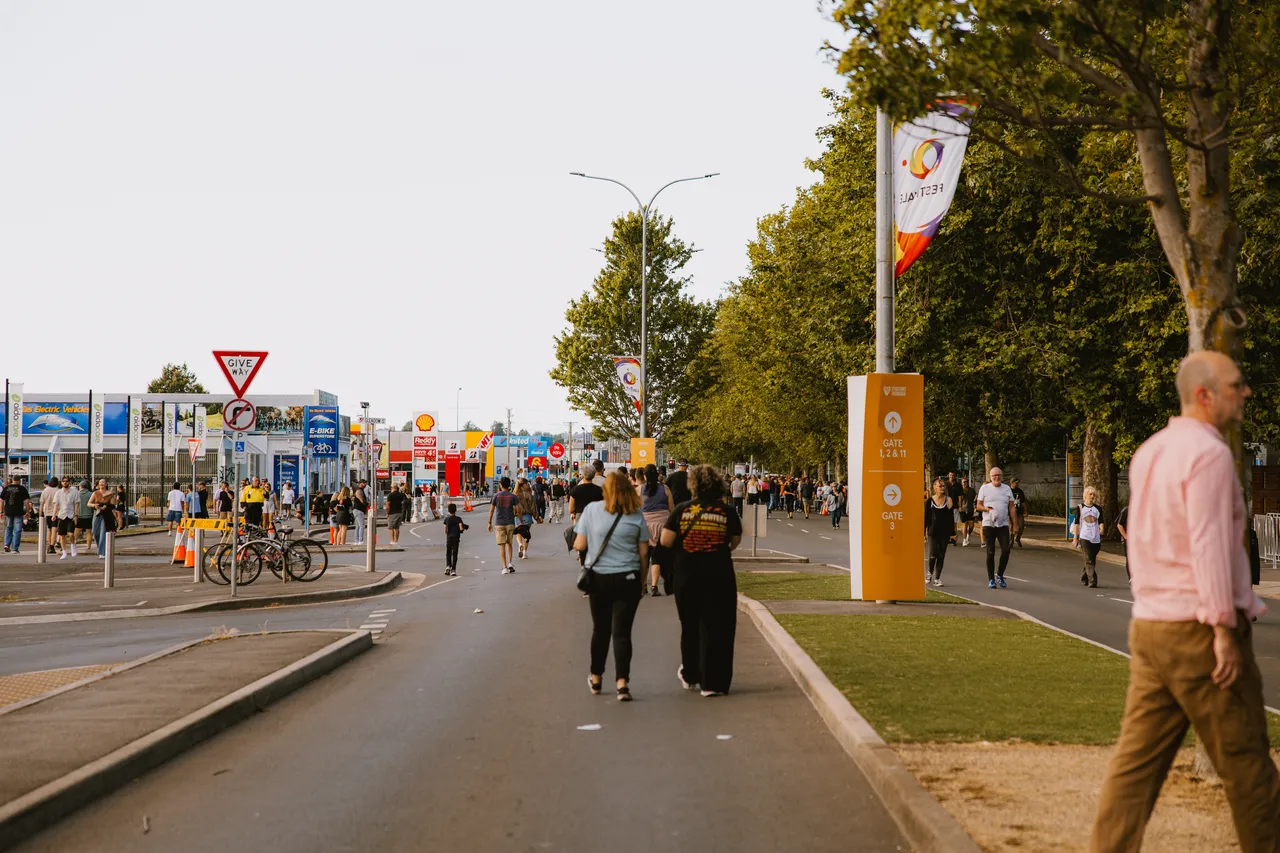 Crowd Walking to Gate at UTAS Stadium