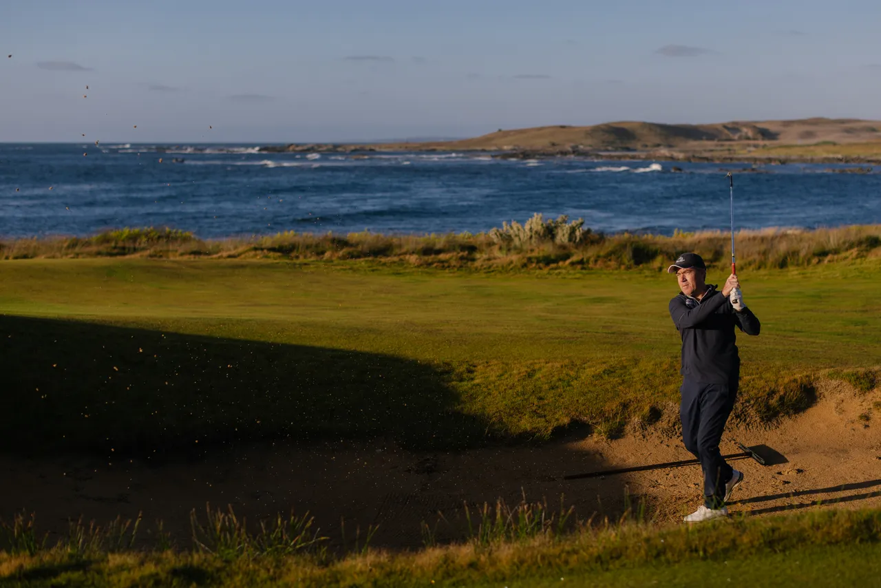 Golfer Chipping from Bunker