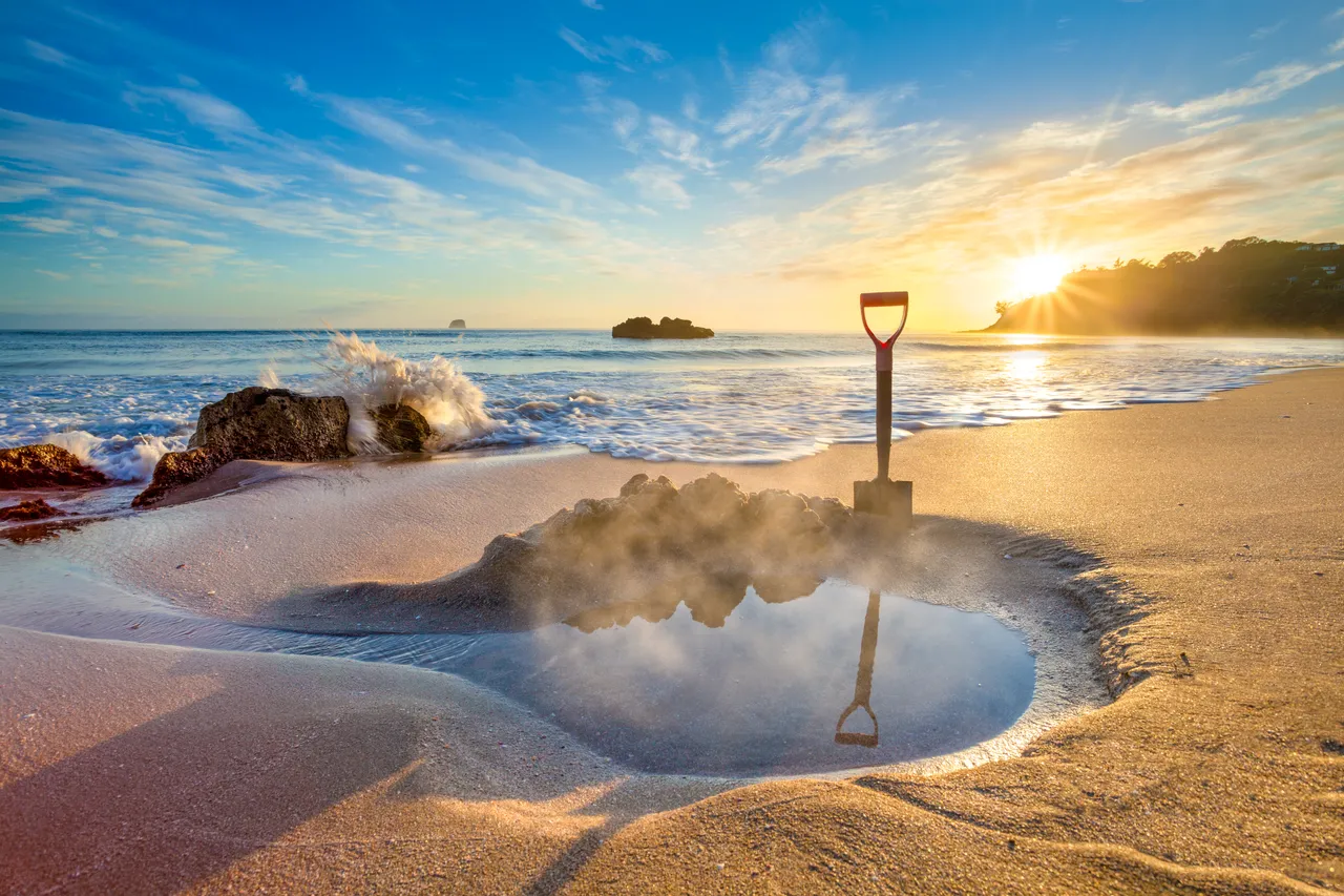 First rays at Hot Water Beach
