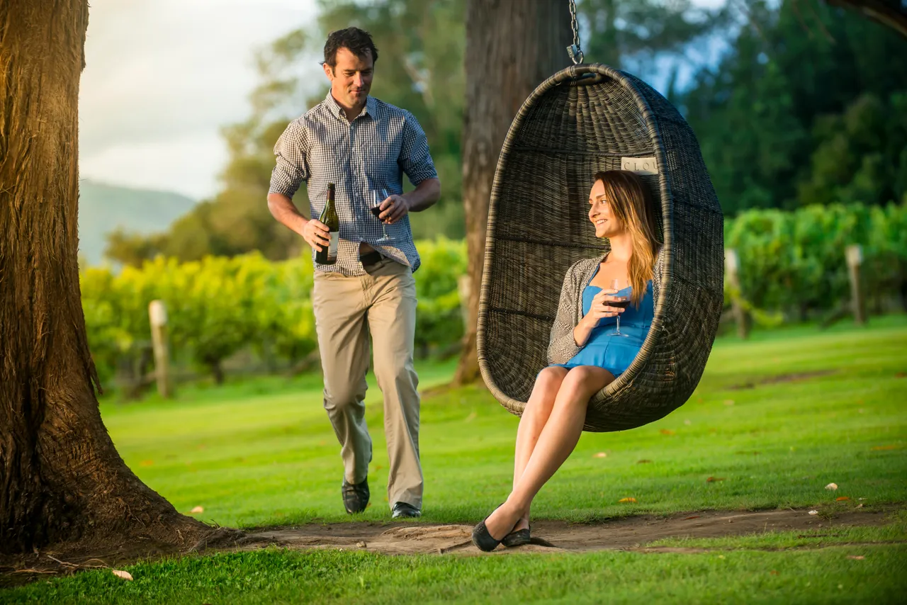 Couple at Cloudy Bay winery at sunset