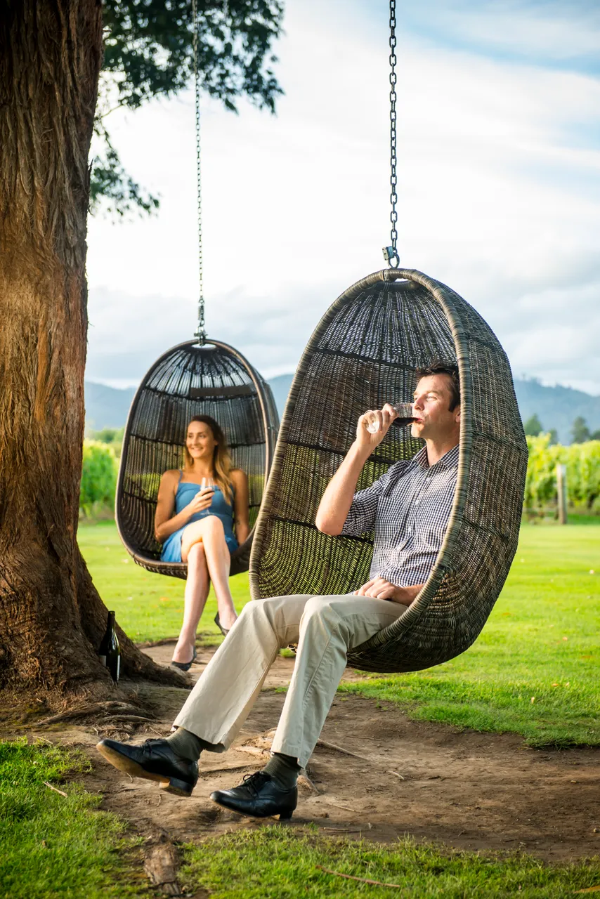 Couple at Cloudy Bay winery at sunset