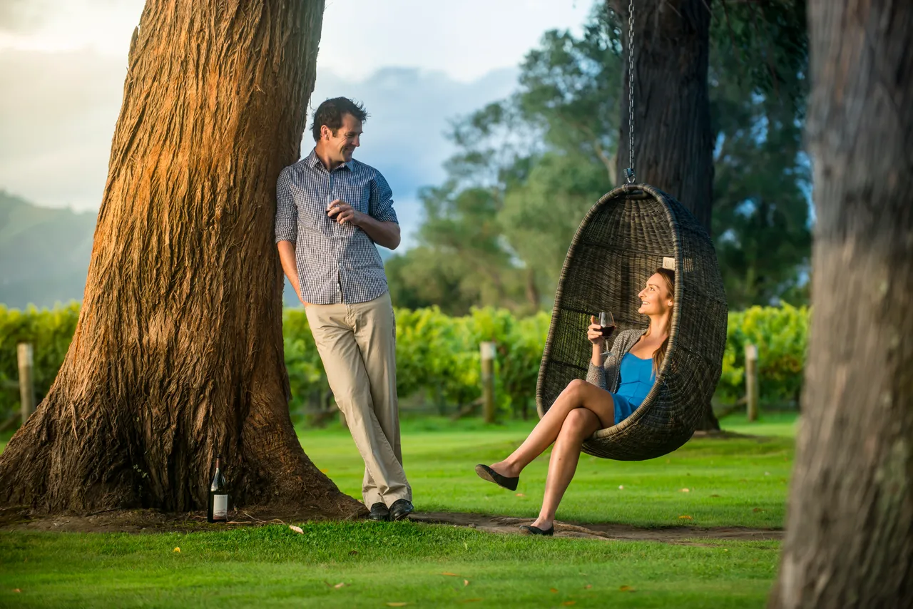 Couple at Cloudy Bay winery at sunset