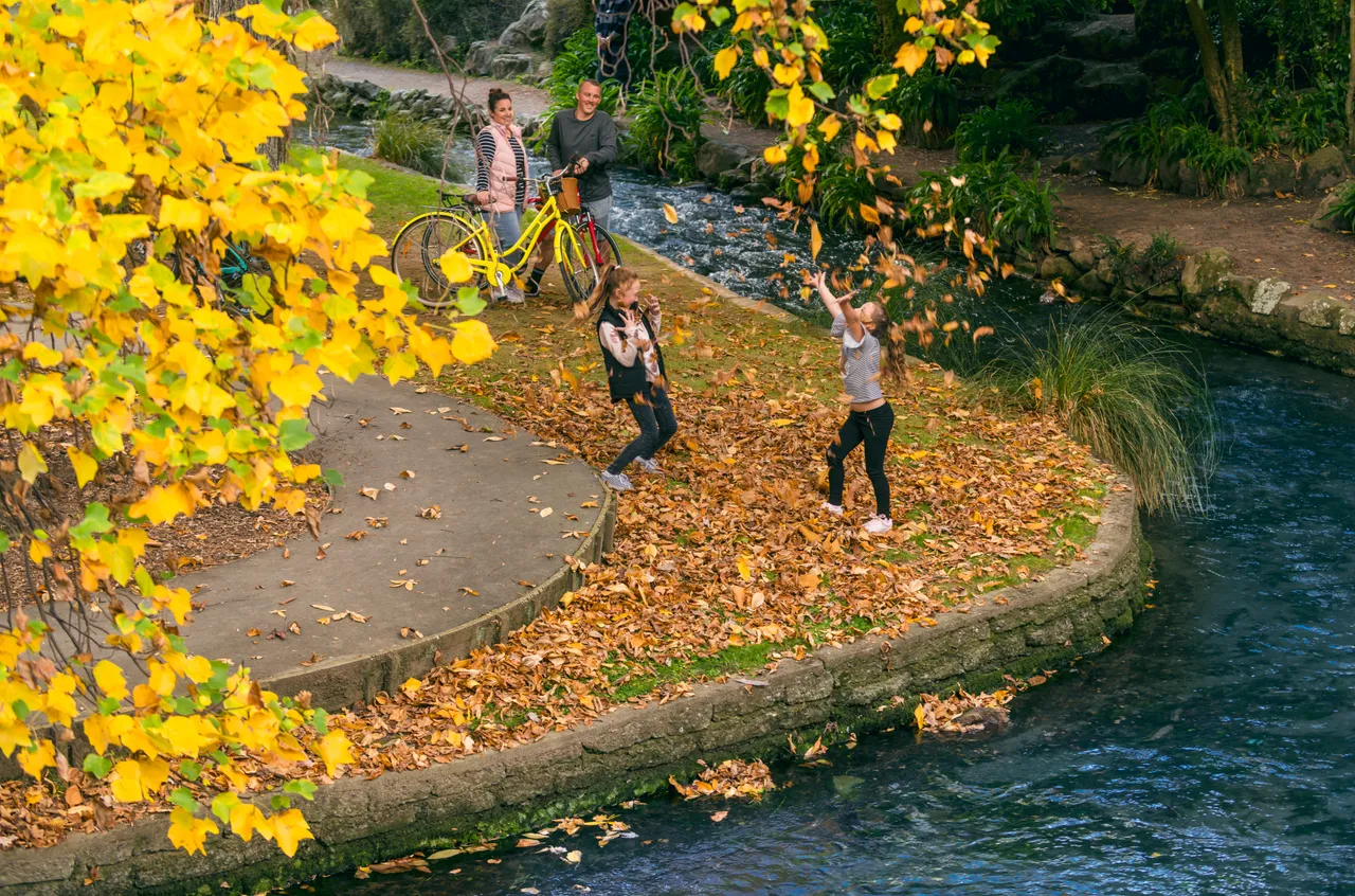 Playing in the Autumn leaves