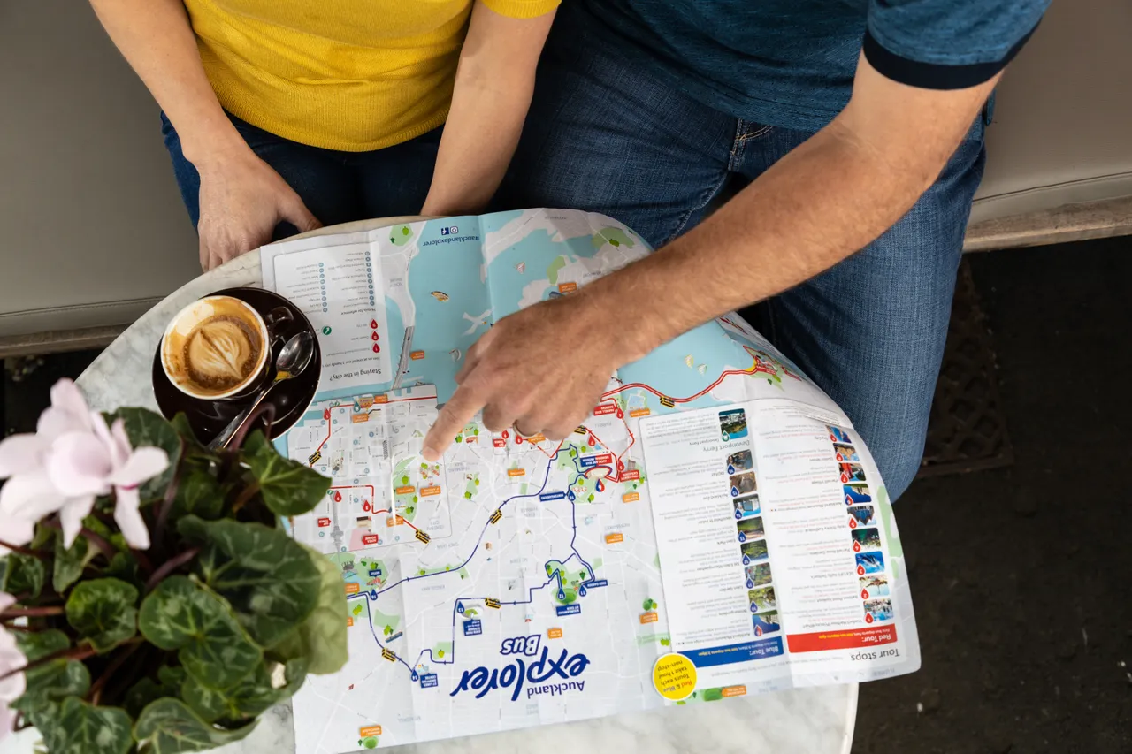 Using Map at Cafe - Auckland Explorer Bus