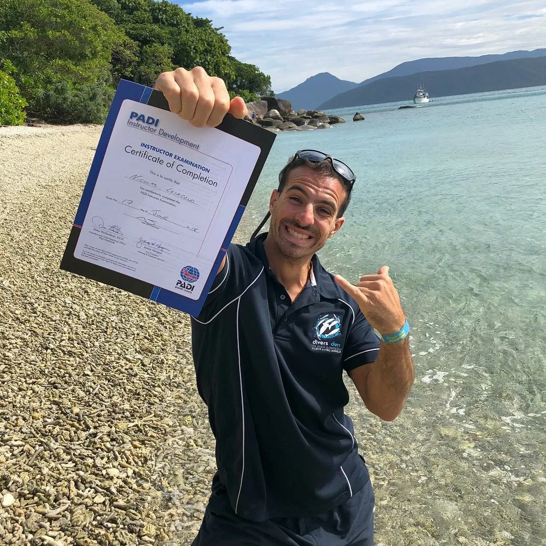 European male holding certificate
