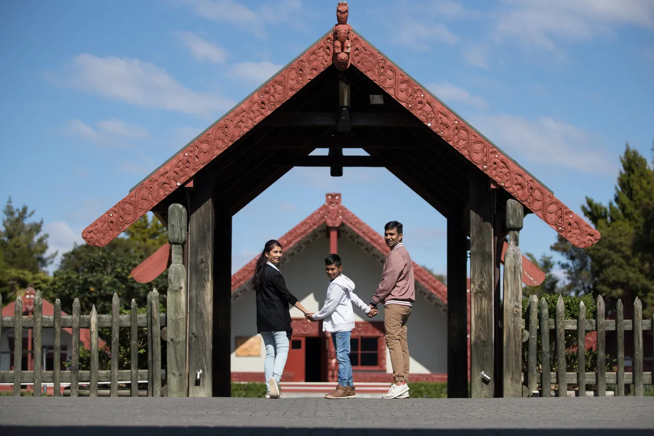 Indian family at Te Puia marae entrance