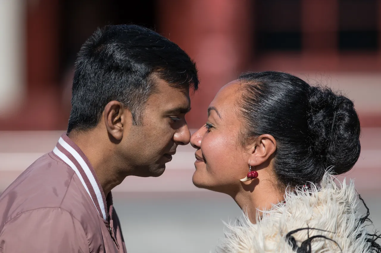 Indian man hongi's female performer at Te Puia