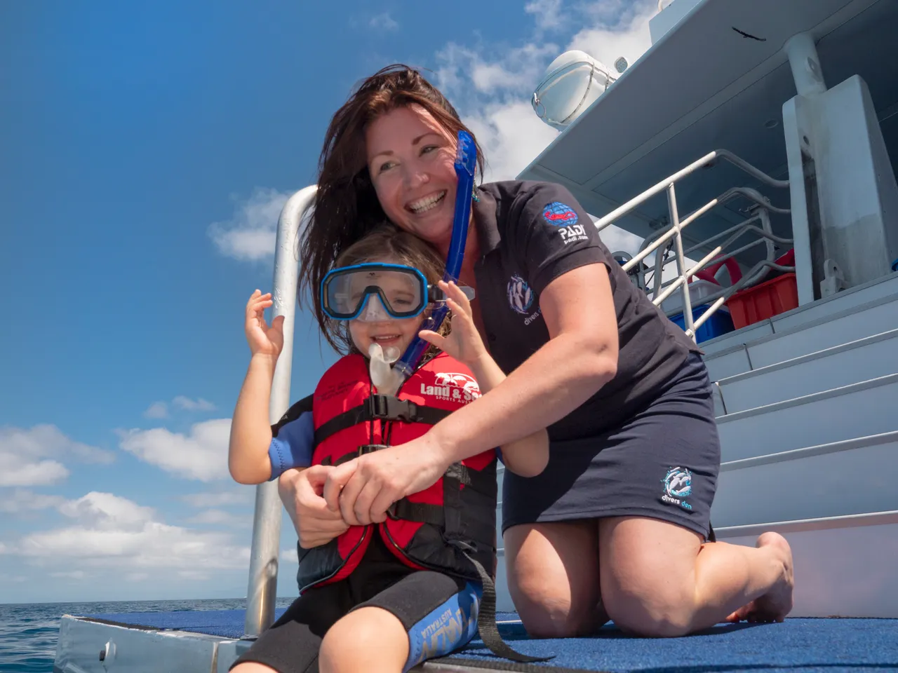 European kid being prepped by a female staff