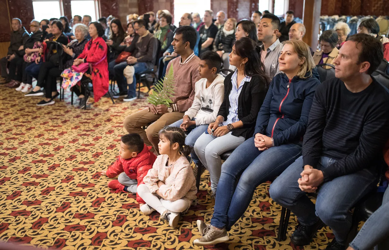 Group watching cultural performance at Te Puia