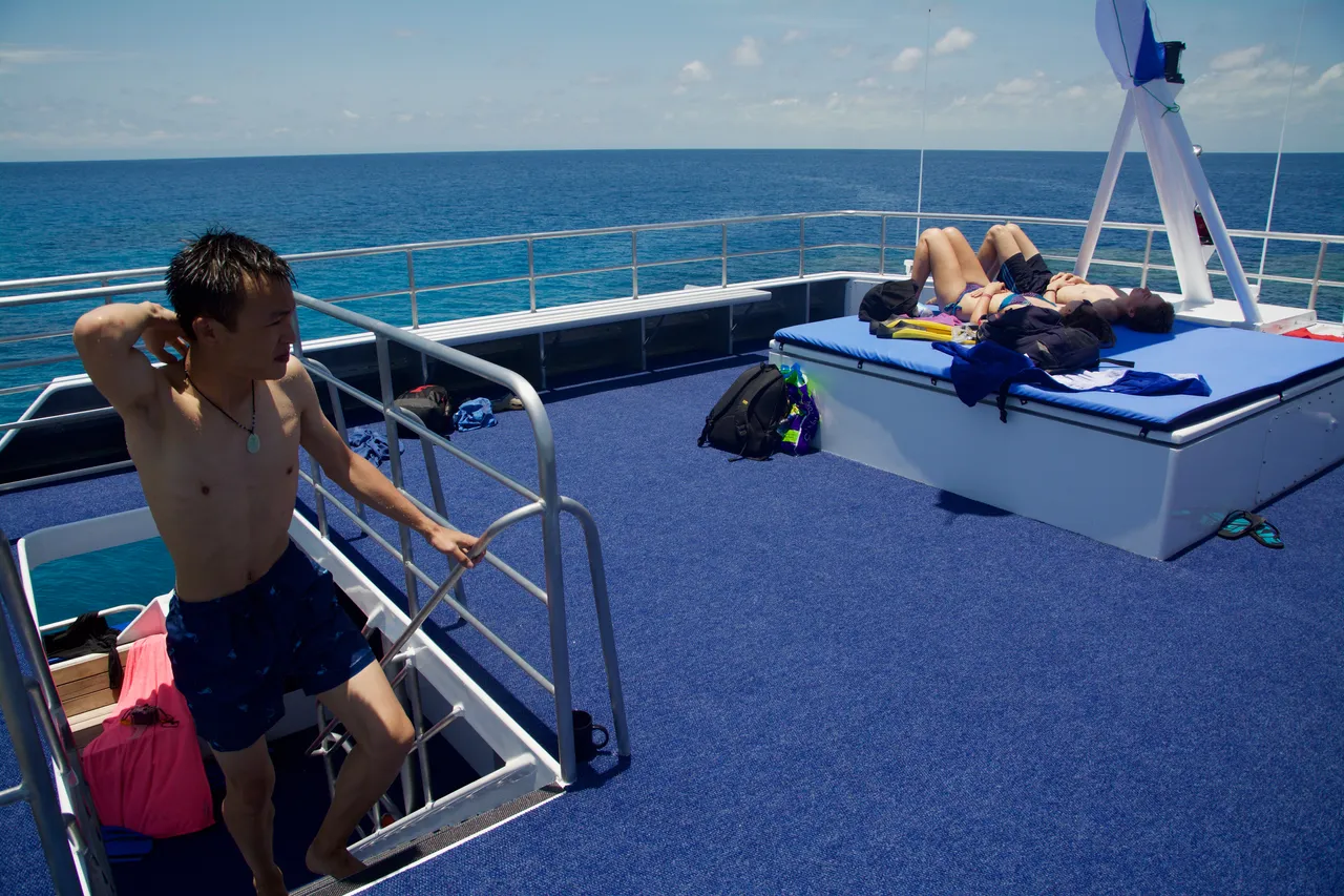 European passengers on the sundeck of ReefQuest