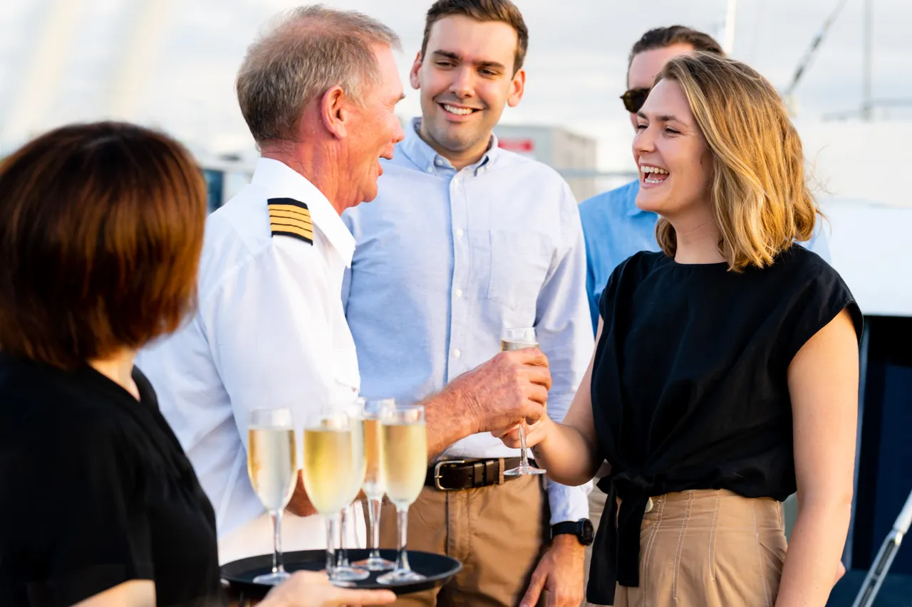 Spirit of Cairns staff welcoming passengers aboard
