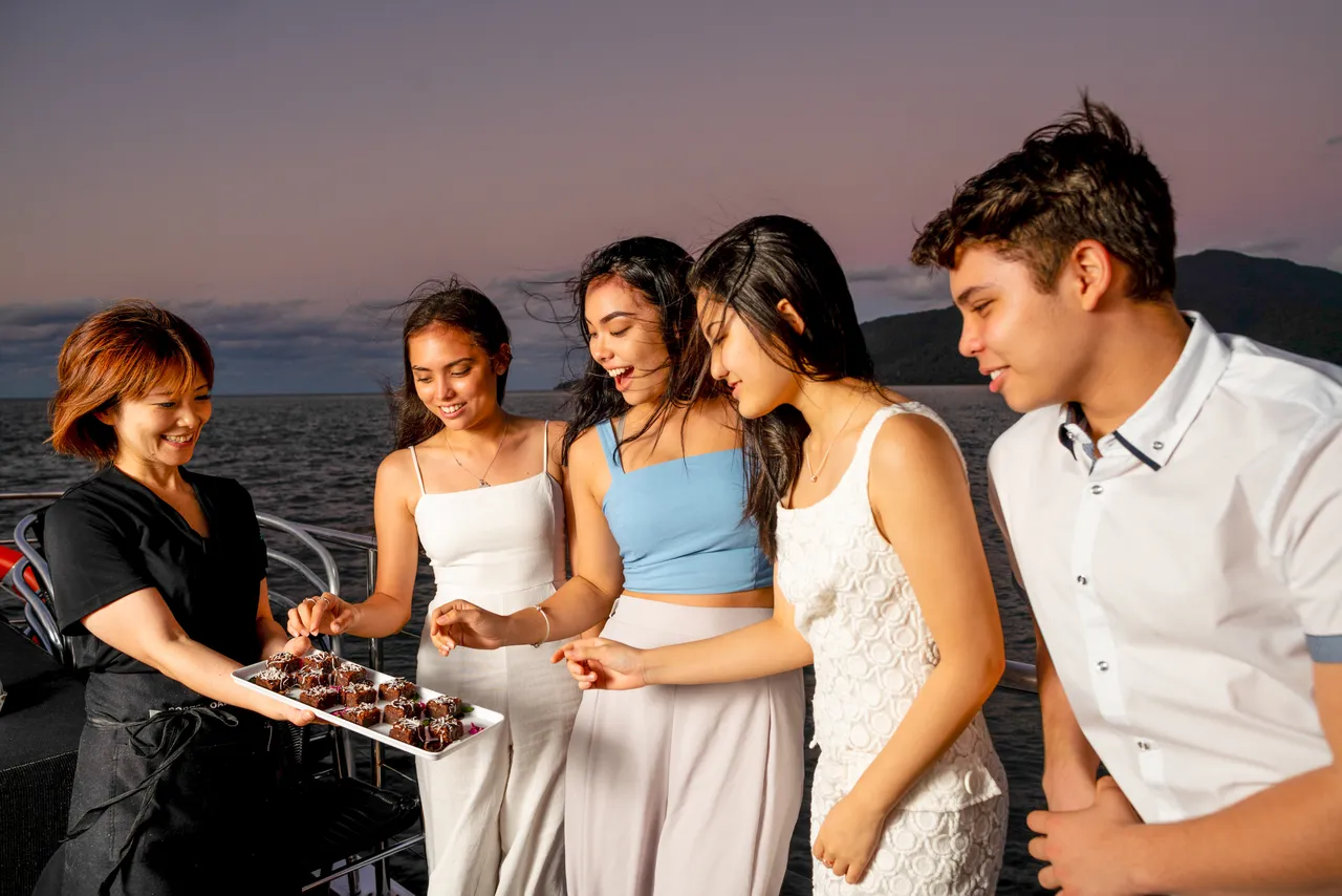 Group of young adult on the Spirit of Cairns dinner cruise