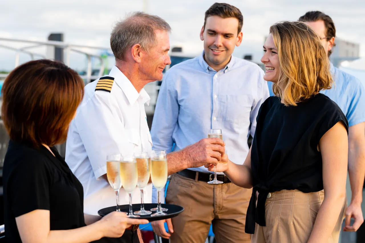 Spirit of Cairns staff welcoming passengers aboard