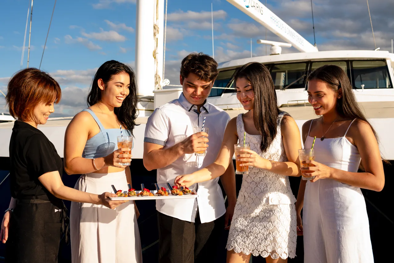 Group of young adult on the Spirit of Cairns dinner cruise