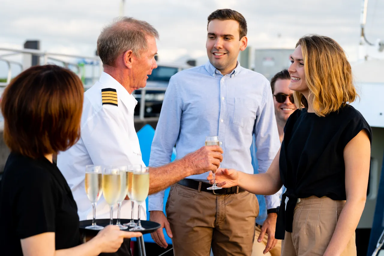 Spirit of Cairns staff welcoming passengers aboard
