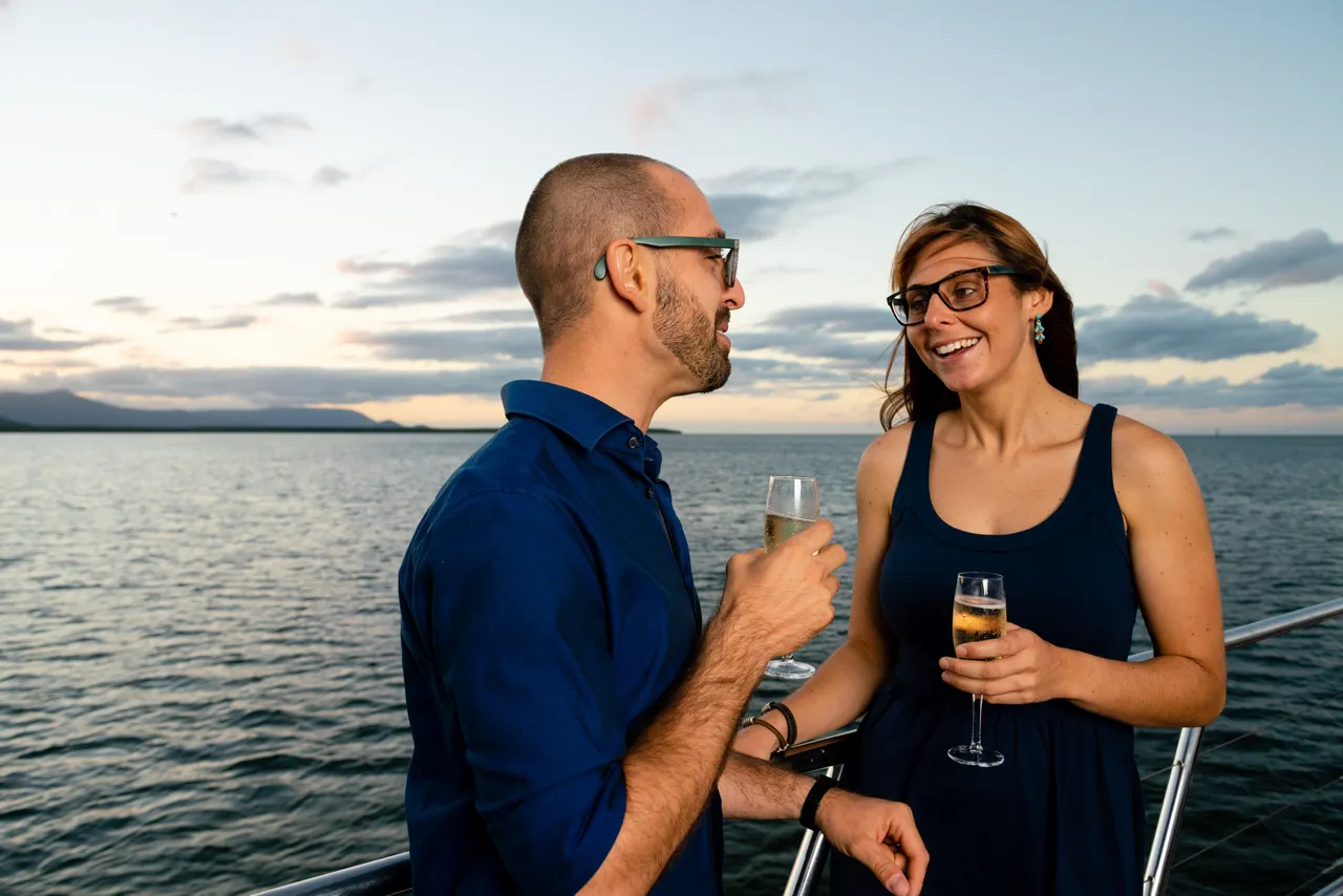 European couple on the deck of Spirit of Cairns