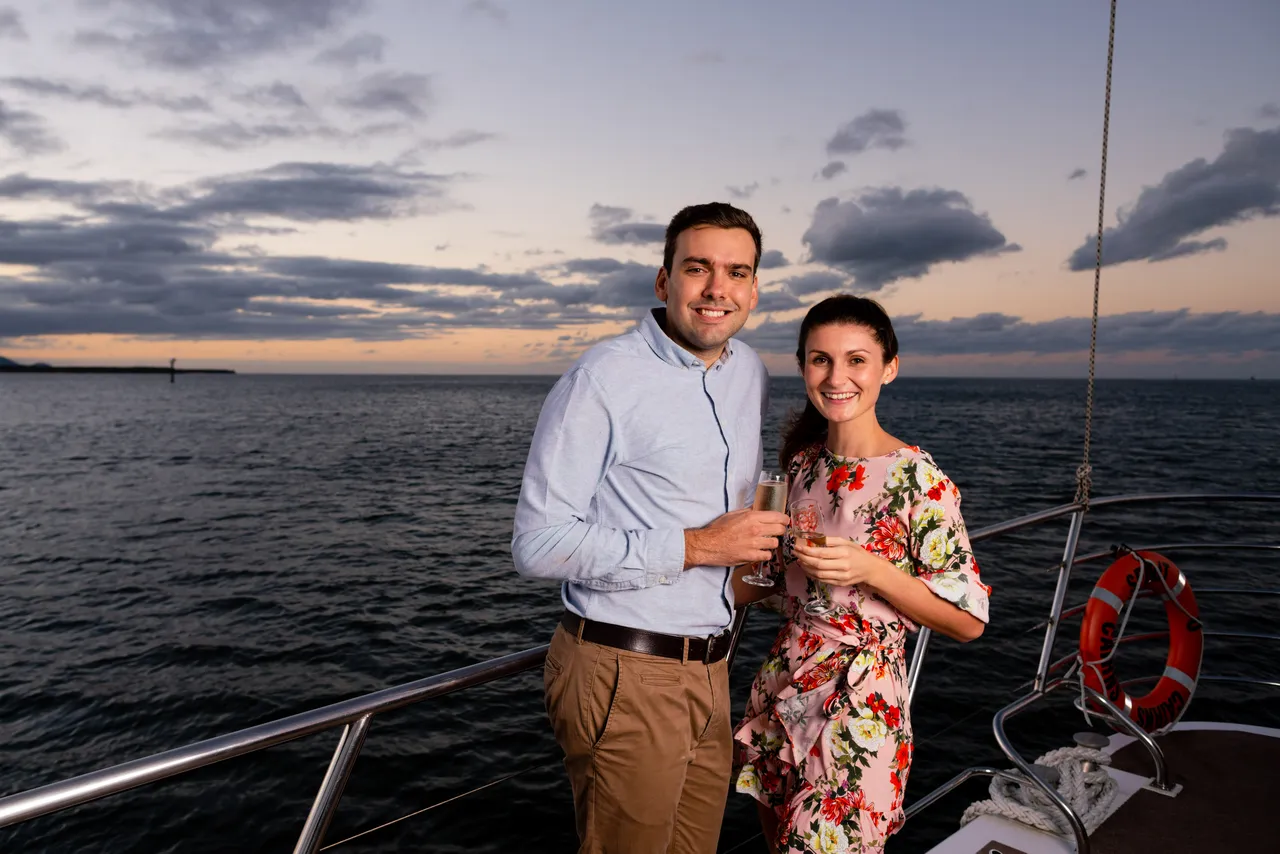 European couple on the deck of Spirit of Cairns