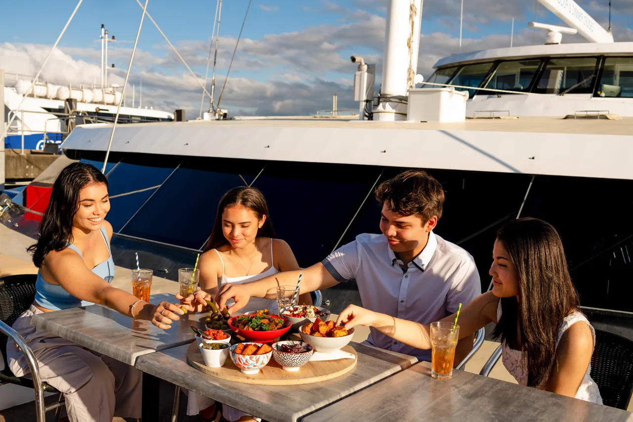 Group of young adult on the Spirit of Cairns dinner cruise
