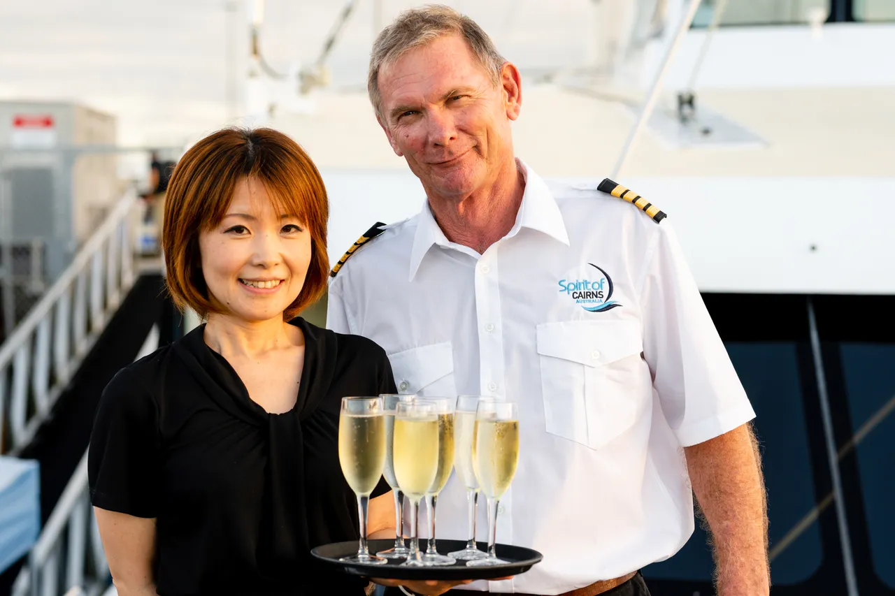 Spirit of Cairns staff welcoming passengers aboard