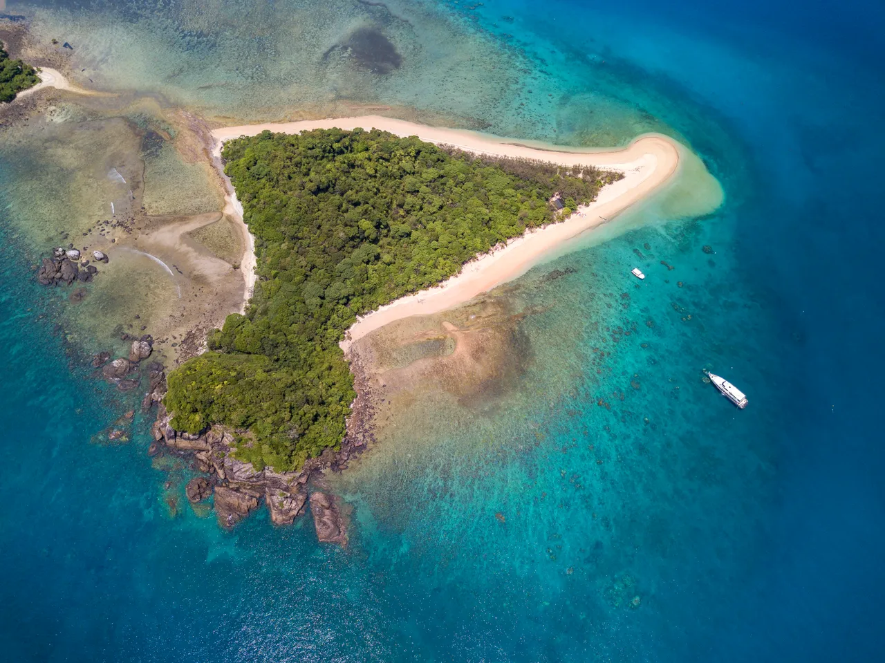 Aerial view of Normanby Island with reefs