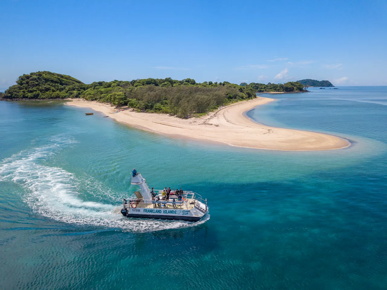 Normanby Island with semi-submersible vessel