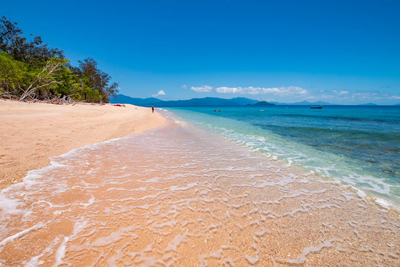 Calm sandy beach on Normanby Island