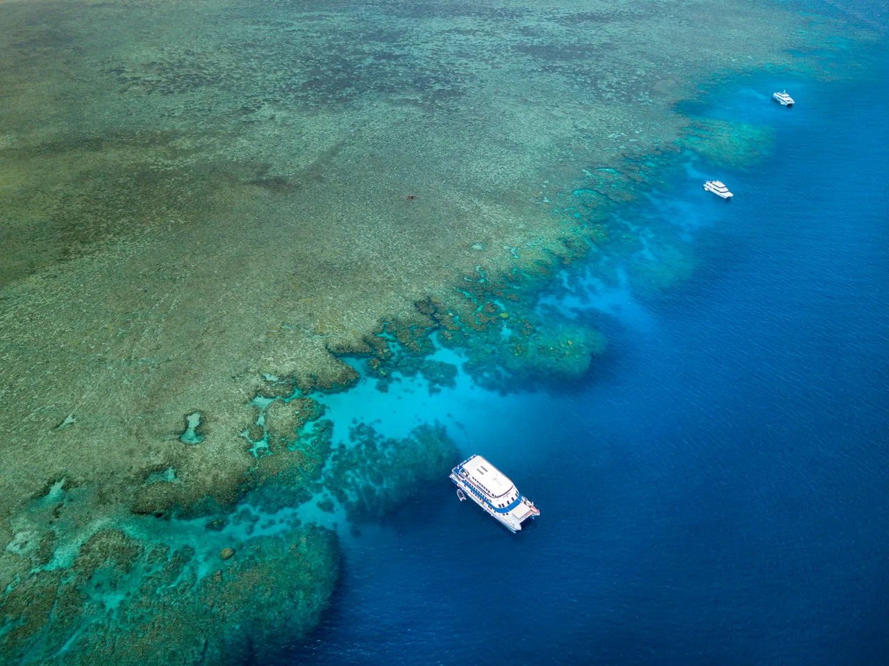 OceanQuest moored at a coral reef