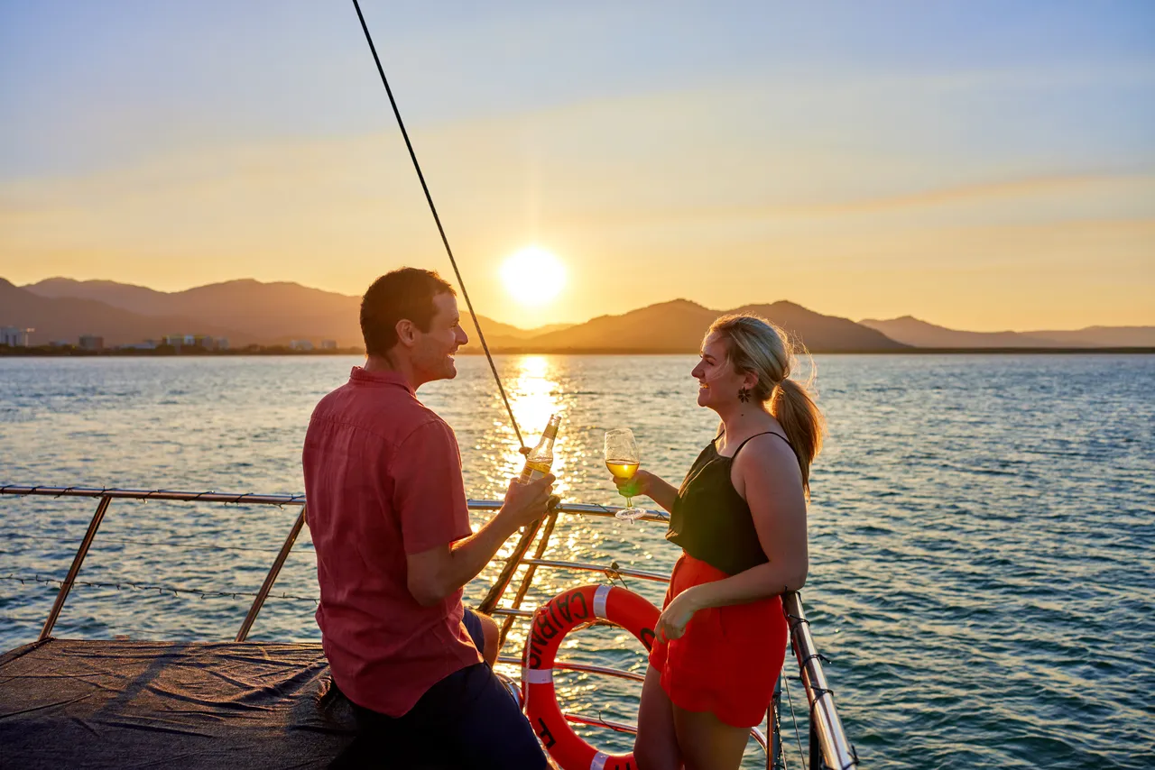 Couple having a drink on the deck of Spirit of Cairns (1)