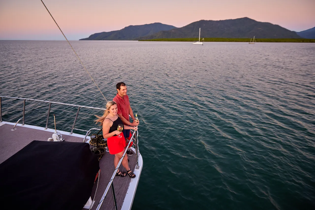 Couple having a drink on the deck of Spirit of Cairns (4)