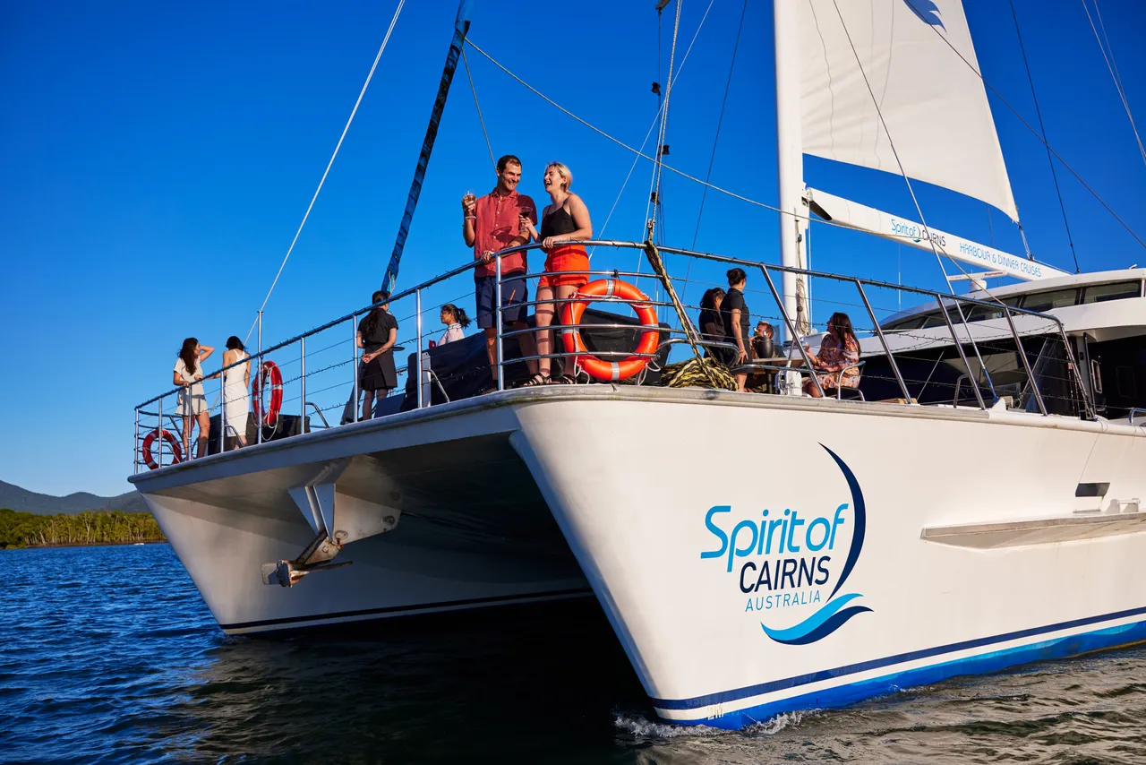 Passengers having a drink on the deck of Spirit of Cairns (2)